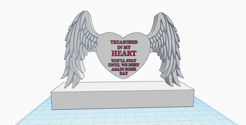 Heart with angel wings on stand, In loving memory of someone special, remembrance, commemoration, memorial gift