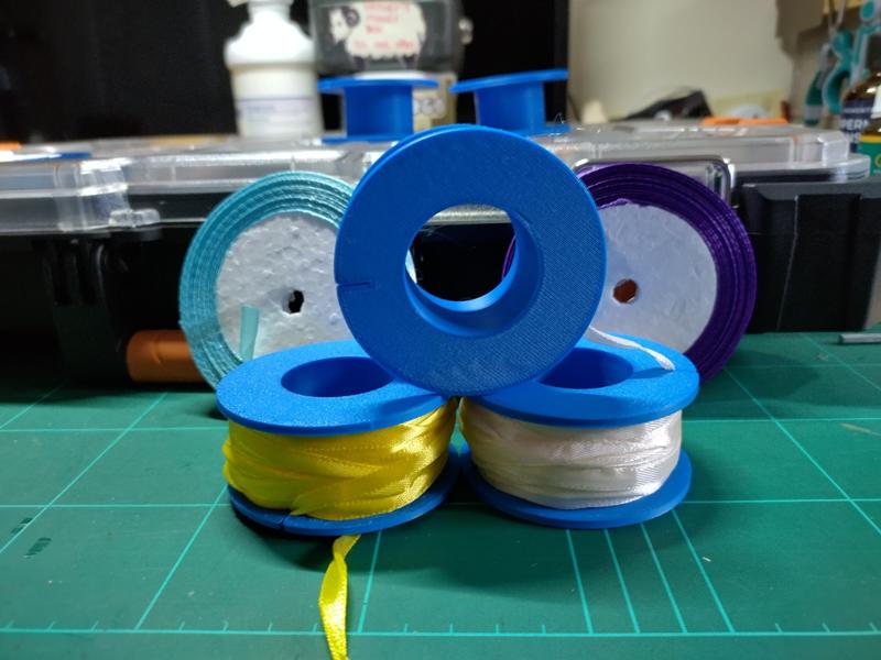 Spool for ribbons, string, etc