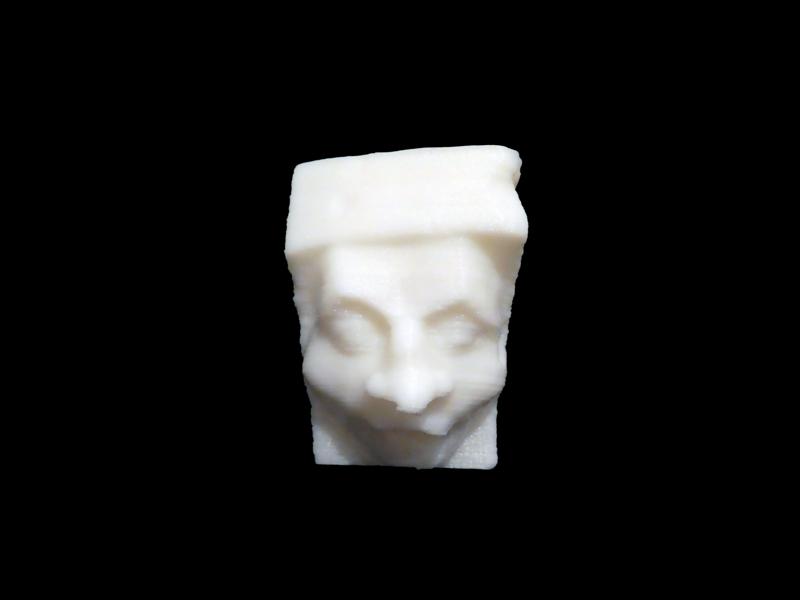 Corbel in the shape of a man's head