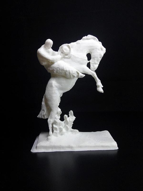 bucking bronco and a steadfast cowboy in wool chaps