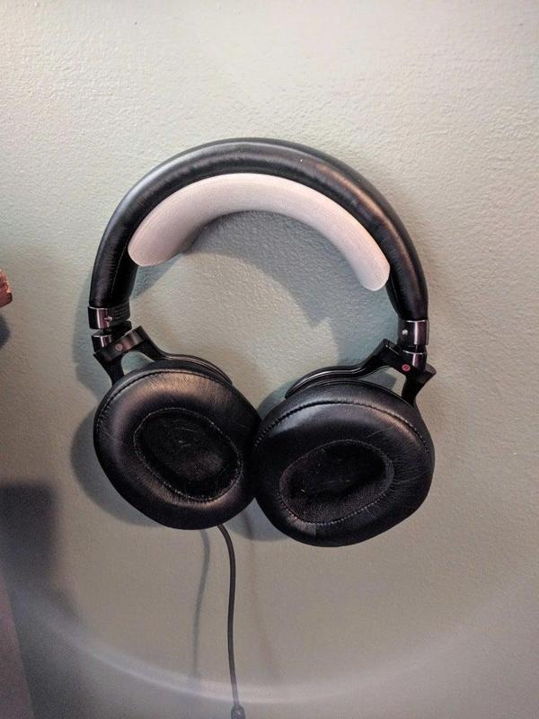 Headphone hanger with hidden wall mount