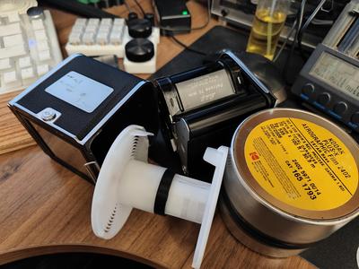 Adapter to extend Jobo 1502 film reels for use with 70mm film