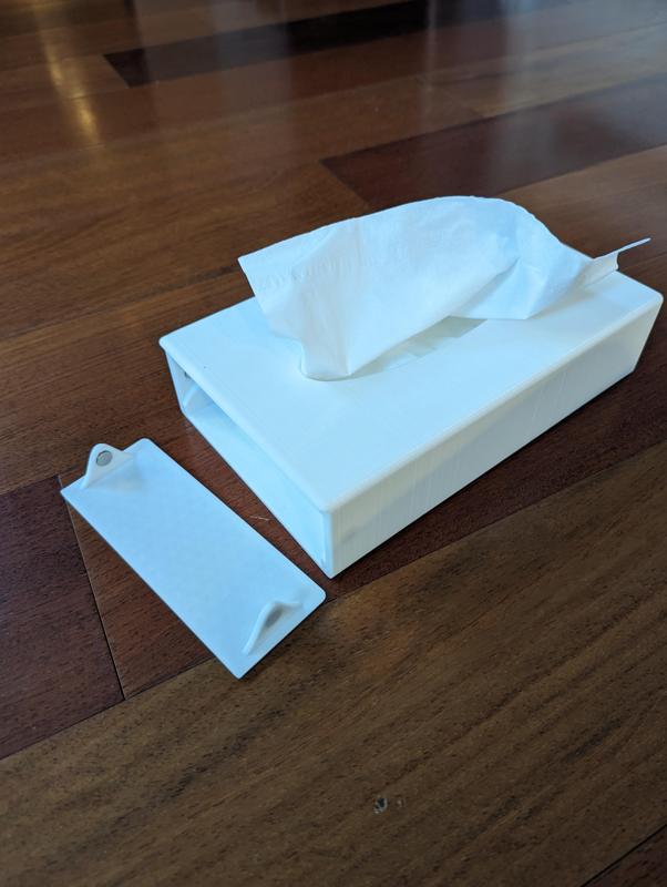 Low profile tissue box