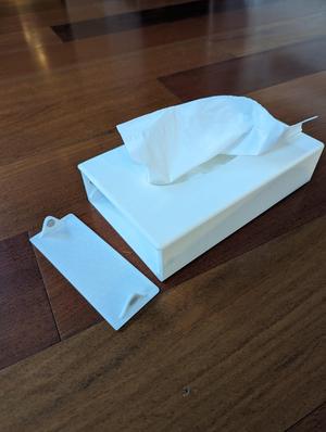 Low profile tissue box