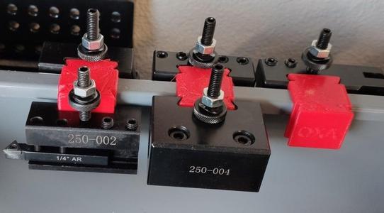 Holder for OXA QCT on a 210V