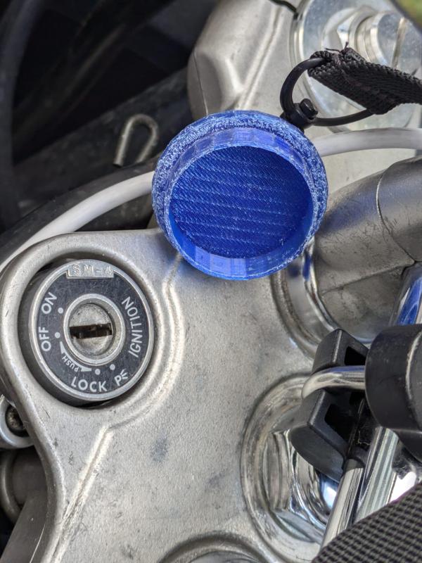 Morocycle lock cylinder rain cap