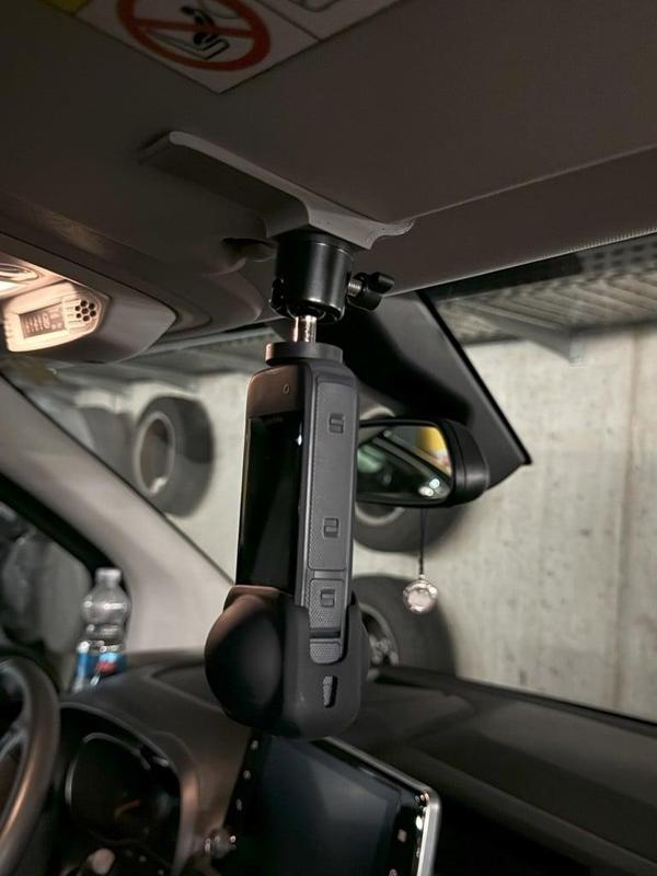 Action cam holder for the sun visor