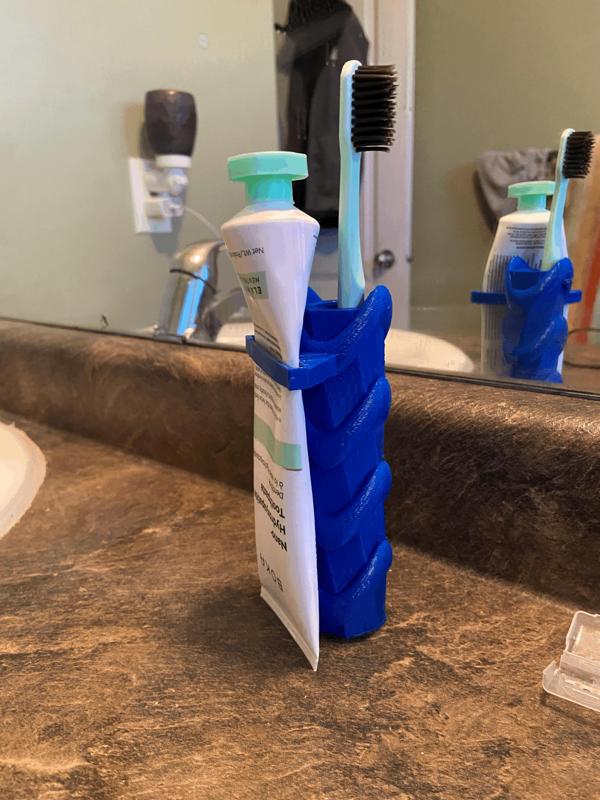 toothbrush and tooth past stand