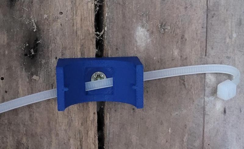 Flexible conduit holder 20