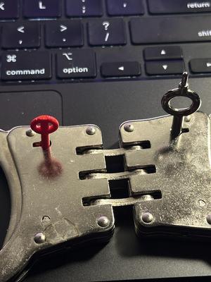 Handcuff key