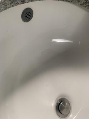Bathroom sink overflow plug
