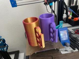 Brass Knuckle Koozie 16OZ