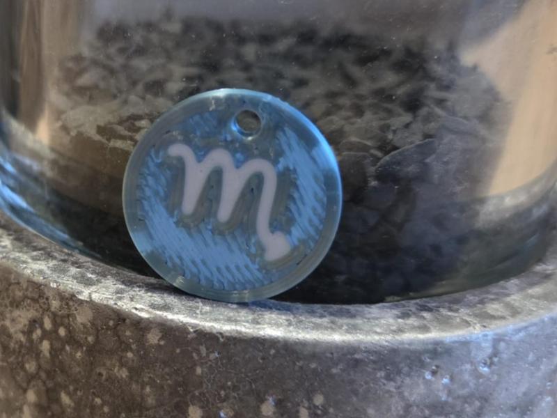 Shopping cart chip with zodiac sign Scorpio