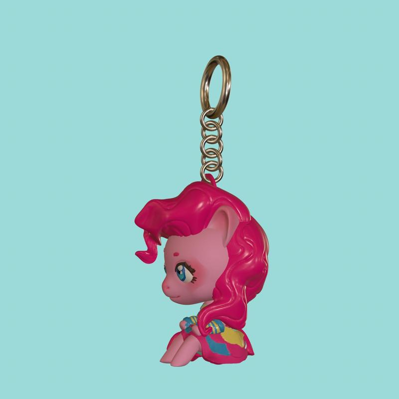 A chibi figurine and keychain of pinky pie from MLP FIM (my little pony , friendship is magic)