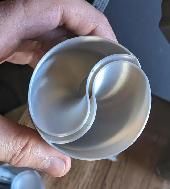 Yin Yang themed dual chamber pencil cup.   