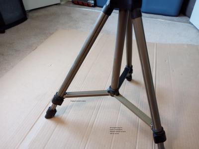 Coupler arm to tripod leg to center column