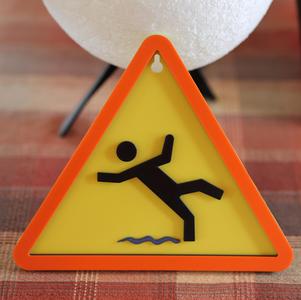 Caution, slippery ground / Attention, sol glissant