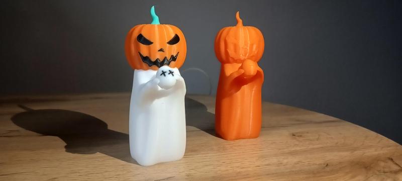 Cute pumpkin head ghost holding his head