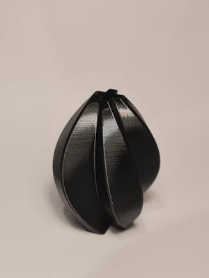 Rounded plus twisted vase