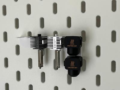 SKADIS nozzle and nozzle-cover holder