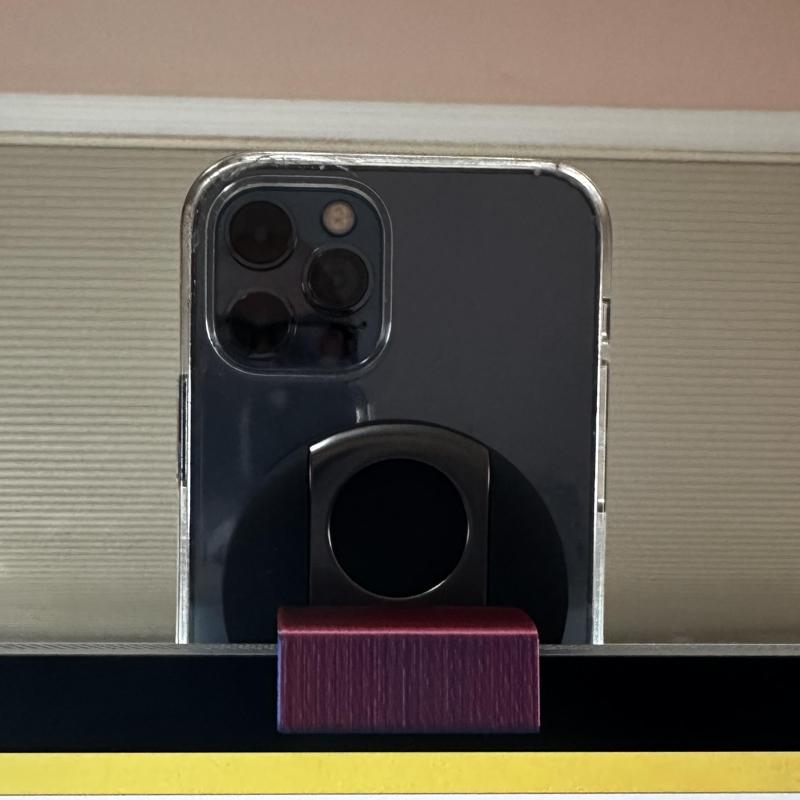 Shim for a Belkin Continuity Camera Mount to use on an Apple Studio Display