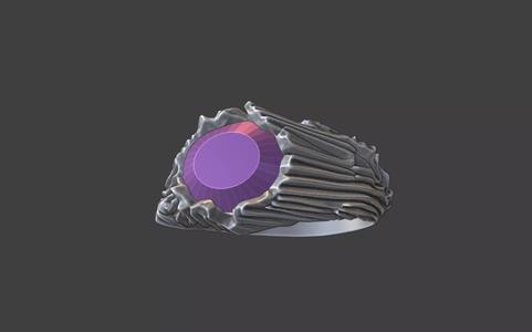 organic rock texture ring  with oval faceted gemstone