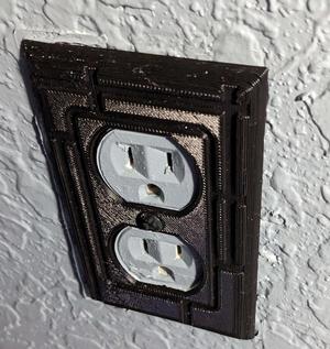"Modern" design outlet cover.