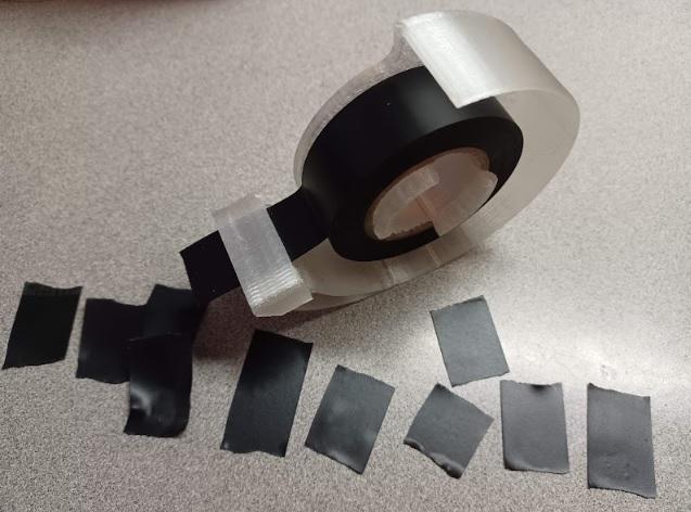 Electrical Tape Dispenser With Cutter, Clamp & Adjustable Tape Spool Holder