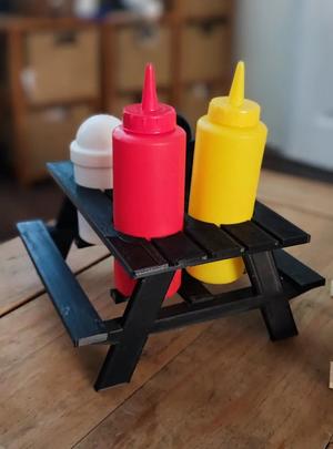 Picnic bench condiment holder