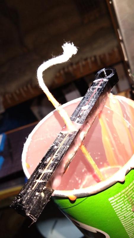 Universal wick-clamp for candle casting