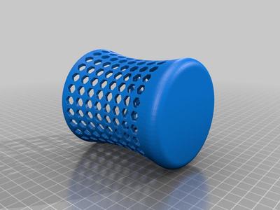 Round recessed pencil cup like a vase with hexagonal slots