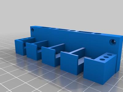 USB cable organizer with slots