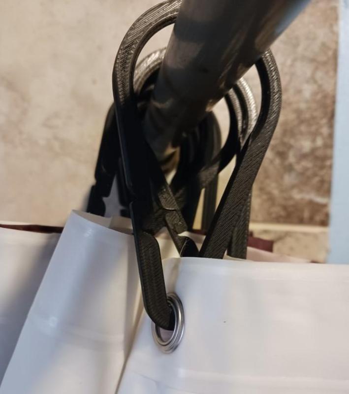 Gravity locking shower curtain ring