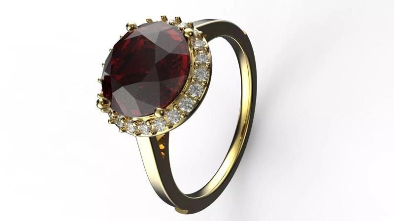 SOLITARIO gold ring with garnet stone and diamonds
