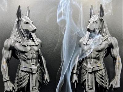 Anubis holding Ankh