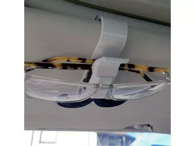 Glasses holder for car sun visor