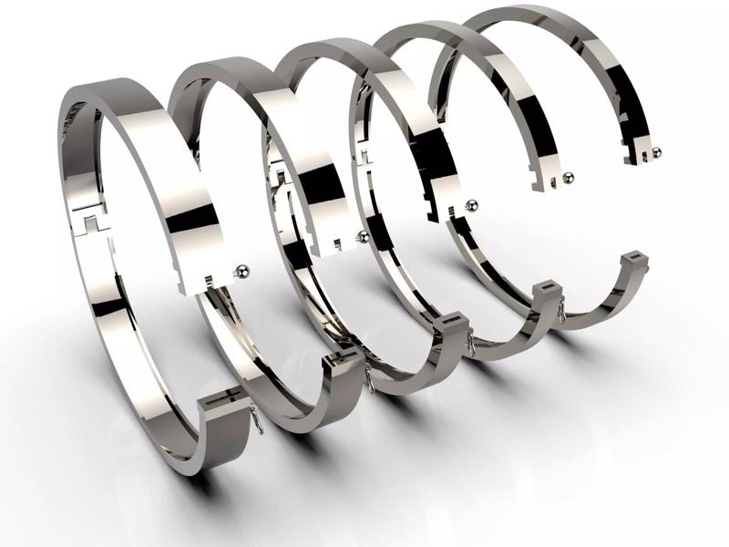 Hinge and lock bracelet