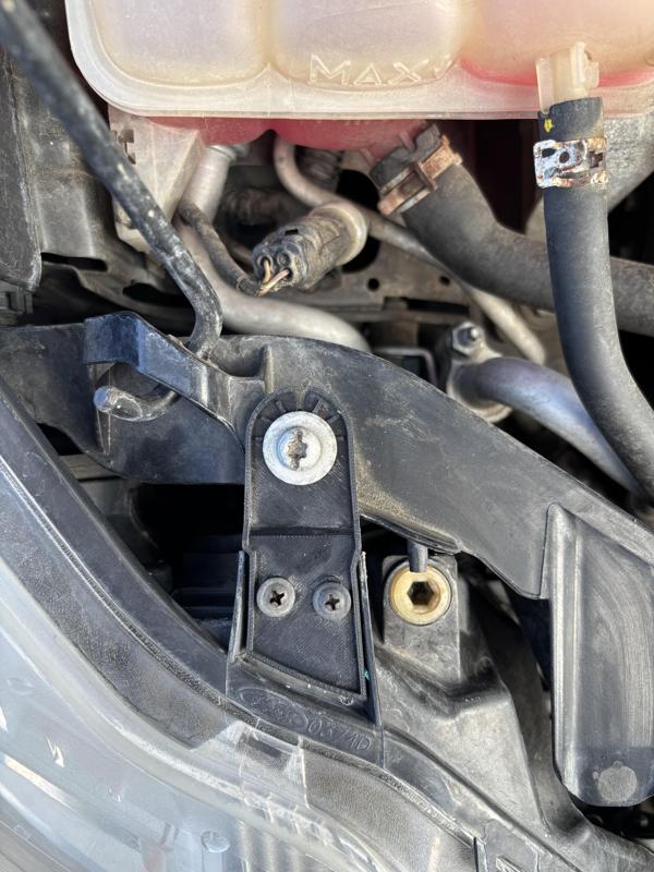 Headlight mount Ford Focus 2