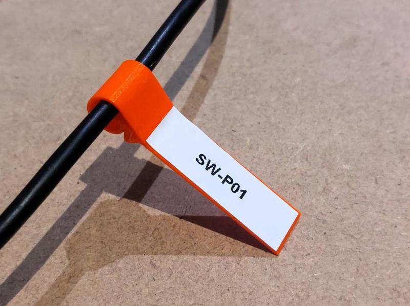 Versatile labeling cable clip. Flag style.   