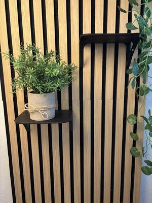 Acoustic panel shelf. 