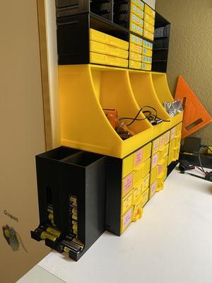 Attachable Battery Dispenser for the Bins