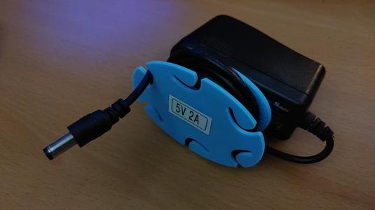 Cord Minder for DC Power Supply