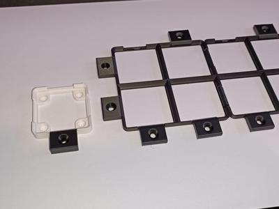 Snap-On screw down tabs for gridfinity baseplates