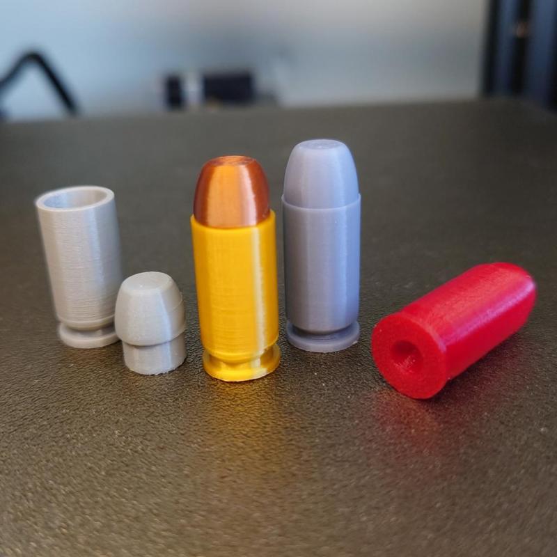 .40 Smith & Wesson replica and snap cap