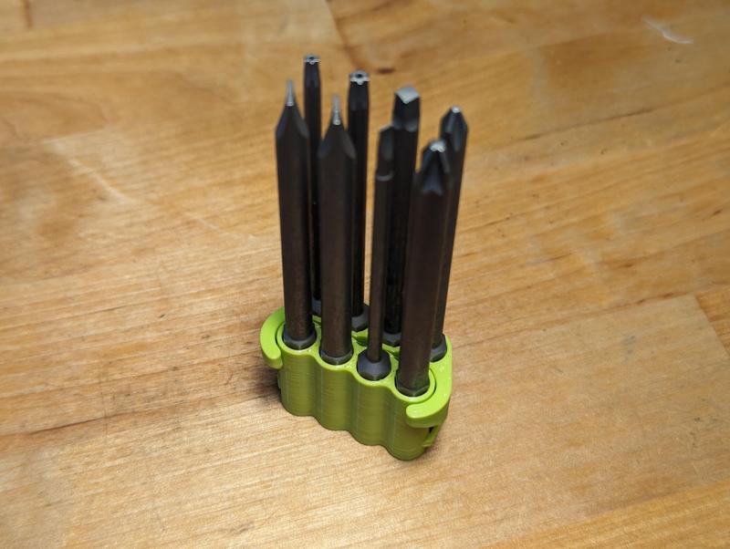 Bit Holder TPU Compliant Hinge Over-Center Folding