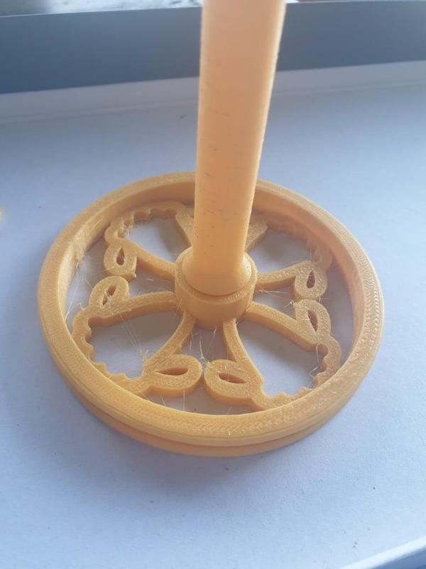 Ashford Standard bobbin with sheep head embellishment remix of HackManiac