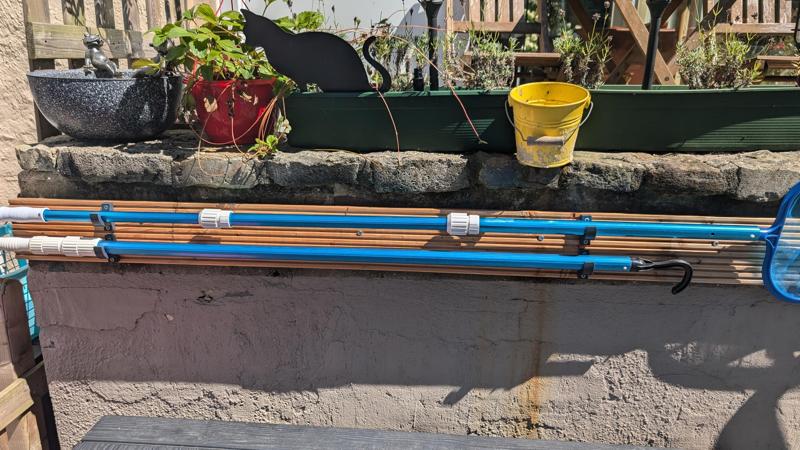 Holder for pool landing nets, hooks etc.