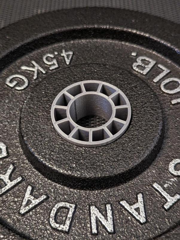 Parametric dumbbell plate adapter