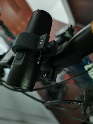Bike flashlight holder