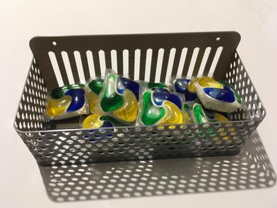 Dishwasher pods holder